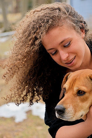 girl_and_dog girl smiling with dog