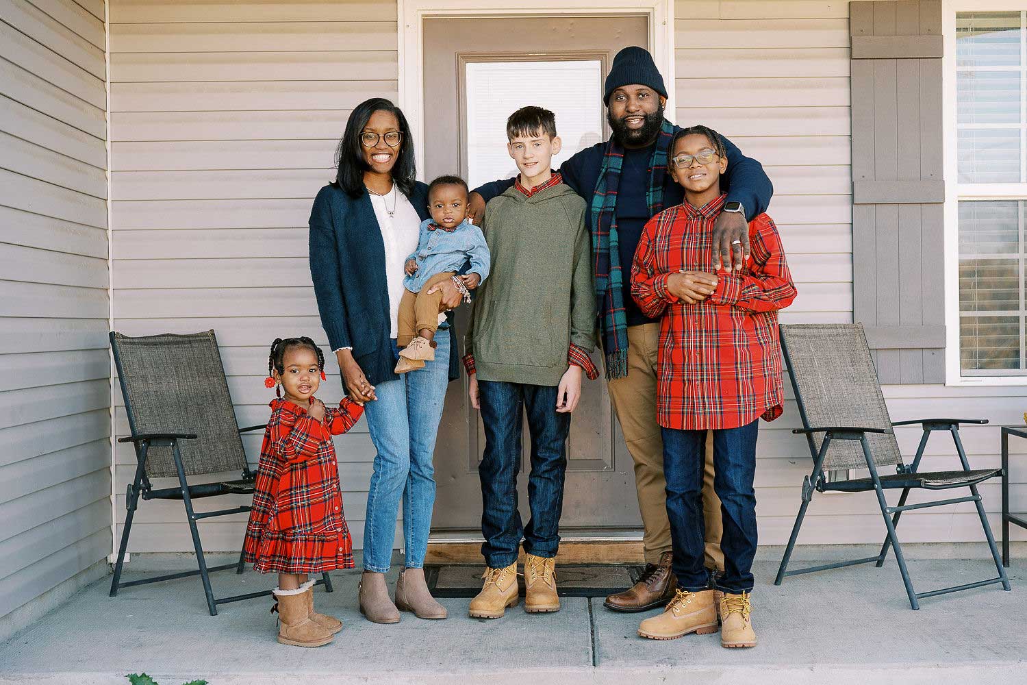 Gill_Fall-2021 Foster parents Dominique and Kevin Gill with their family