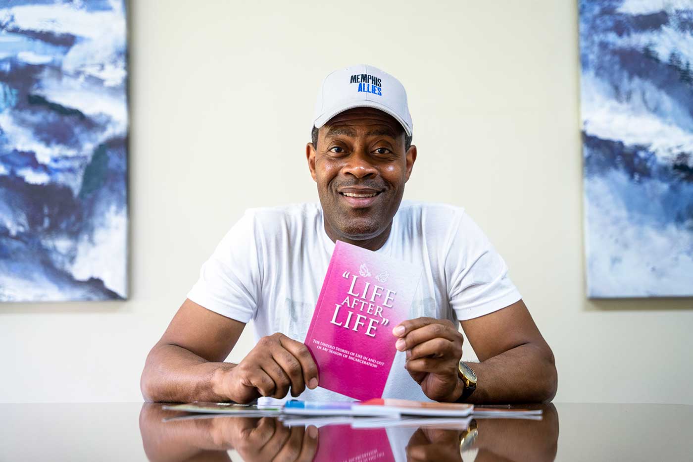 Royal_Chatman Memphis Allies staff, Royal Chatman showcasing his book "Life after Life"