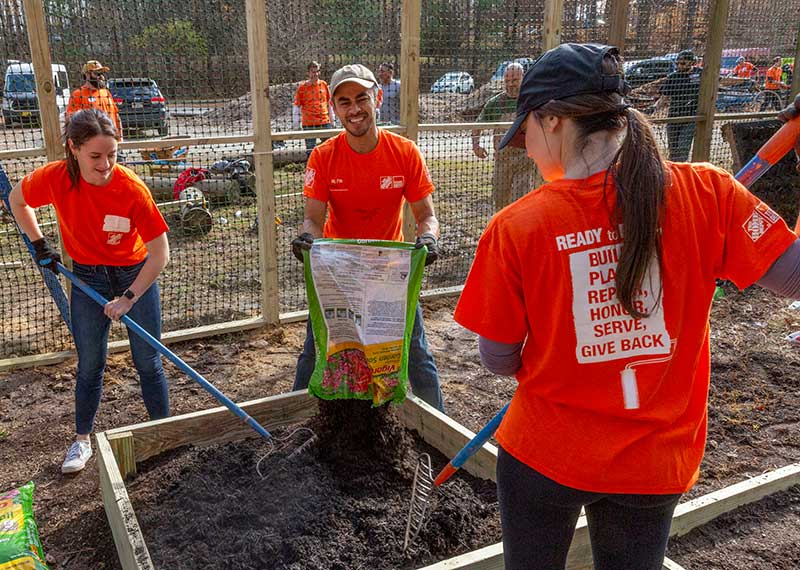 Home_Depot_Volunteers_Inner_Harbour Home Depot volunteers gardening at Youth Villages Inner Harbour Campus