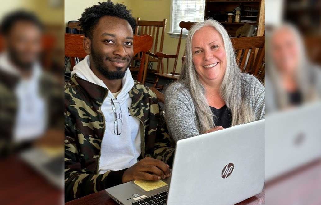 LifeSet-youth-with-Specialist LifeSet youth on his laptop with his Specialist