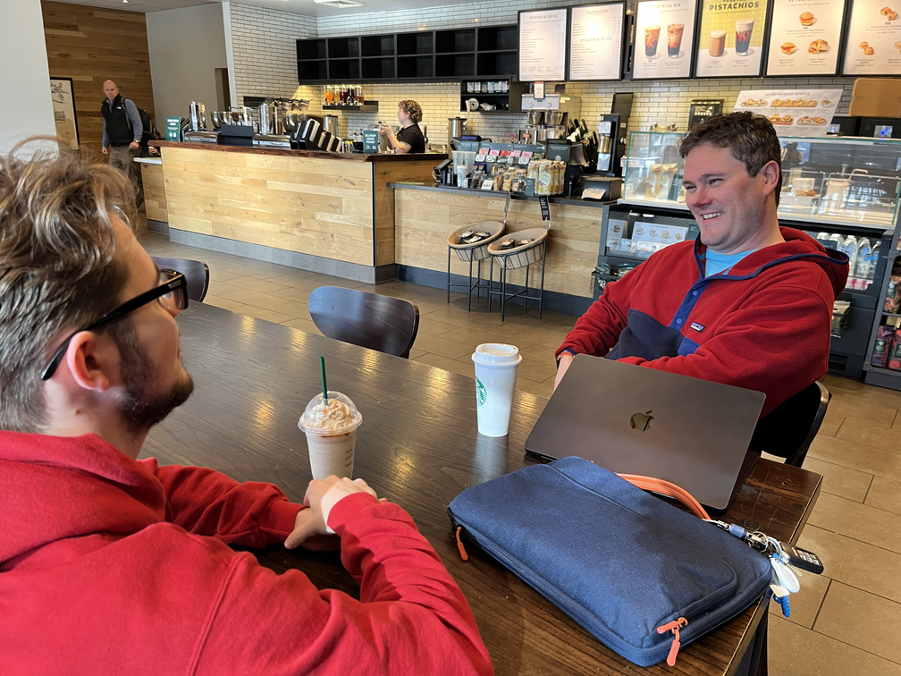 Adam_Christian_Mentorship_2 Adam and Christian having coffee laughing