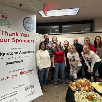 It’s a wrap! Bridgestone Americas and Jackson® team up with Youth Villages to wrap gifts for former foster youth as part of Holiday Heroes.