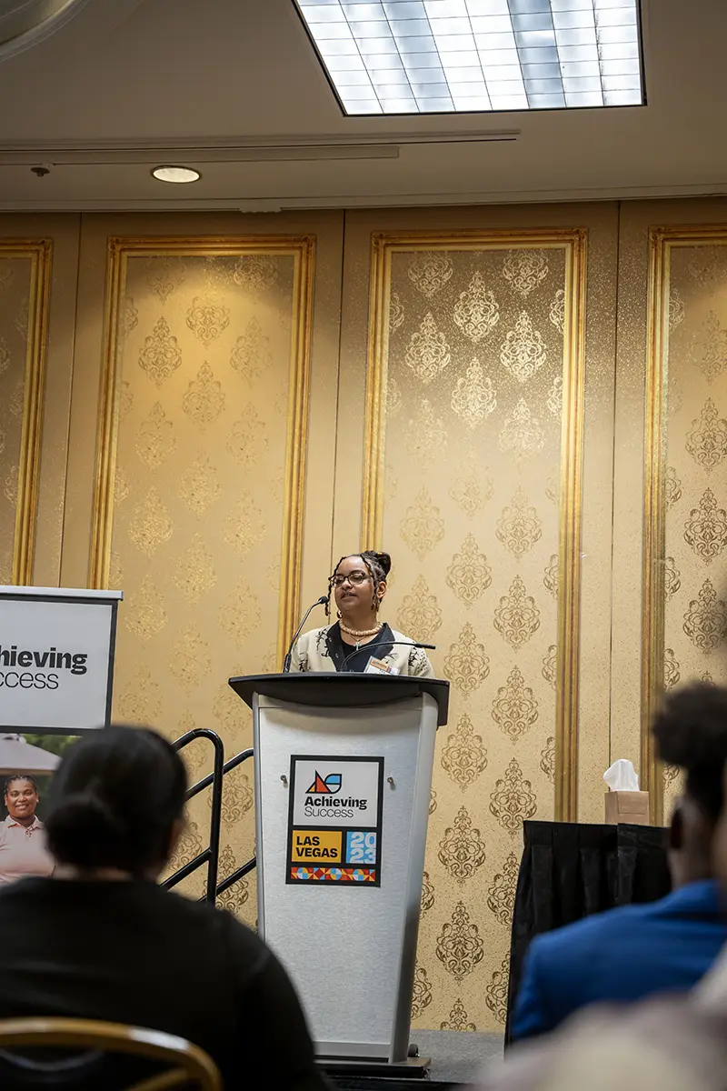 Tyra_Speaking_Achieving_Success_2023 Tyra speaking at Achieving Success convening