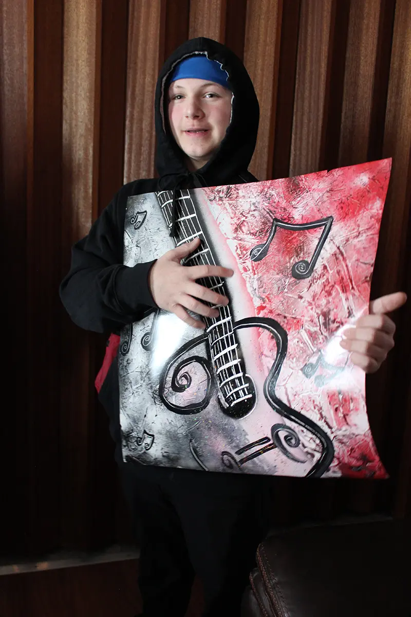 Jay_Intercept-2 Jay holding a guitar poster