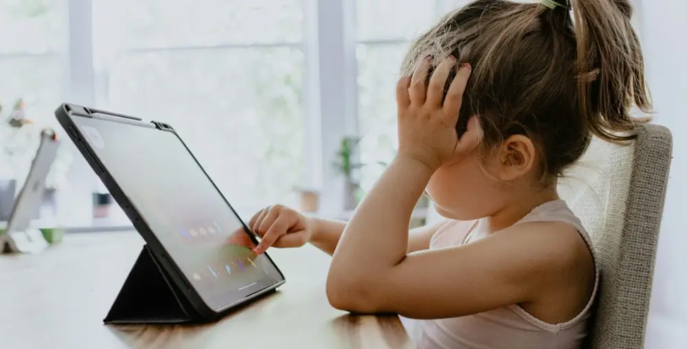 young-girl-on-tablet young girl on a tablet