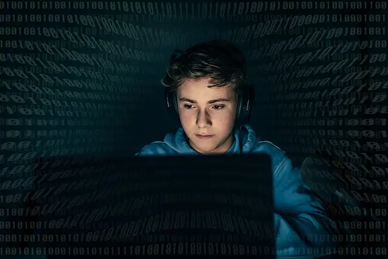 Online Safety - teen on laptop teen on laptop
