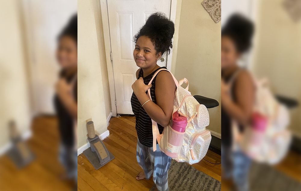 Arianah Backpack Heroes youth with backpack provided through Backpack Heroes campaign