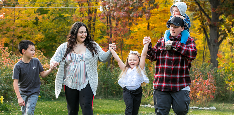 Goreham_New_Hampshire_Intercept_family_walking Intercept mother and son holding hands