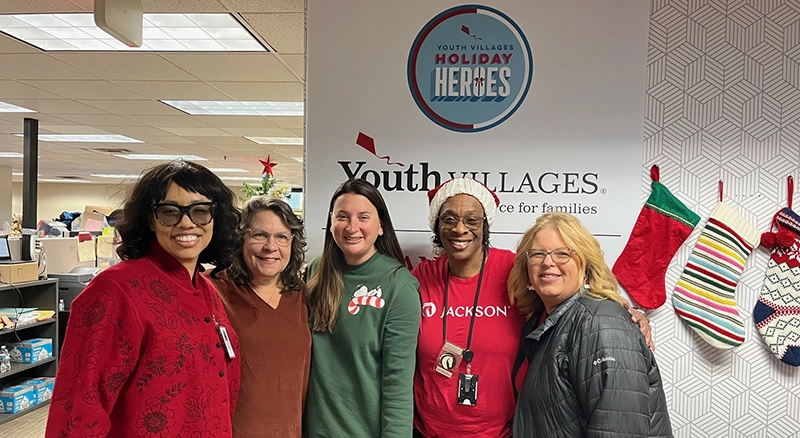 Jackson-holiday-heroes corporate volunteers from Jackson help with Holiday Heroes