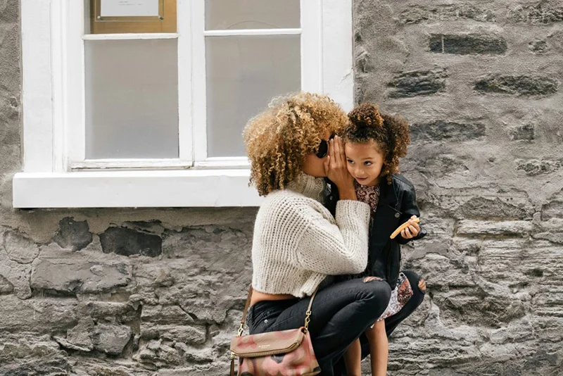 7-ways-to-add-joy-blog mother holding daughter