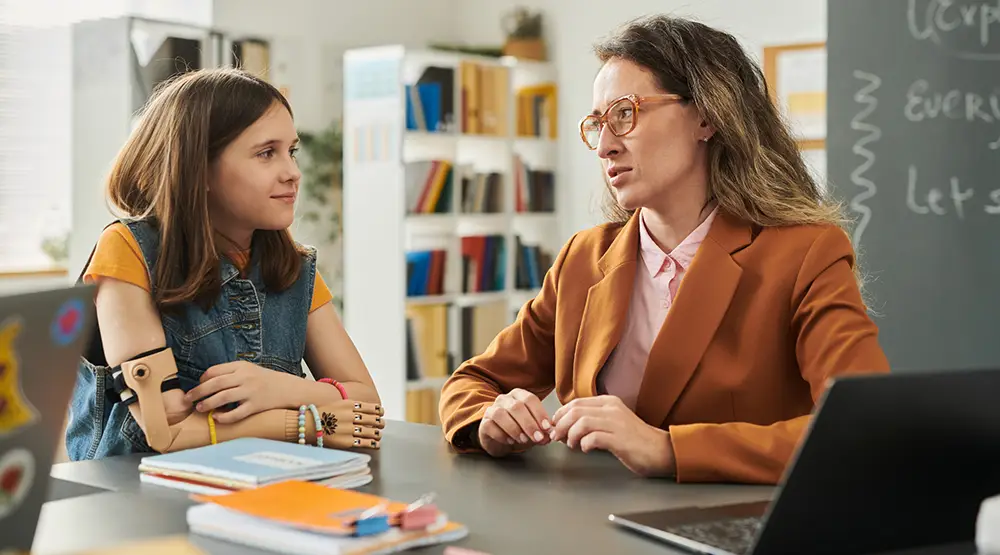 mentee and mentor talking