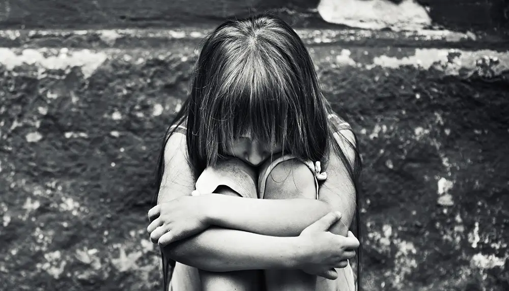 YV25-Neglect Story young person sitting down