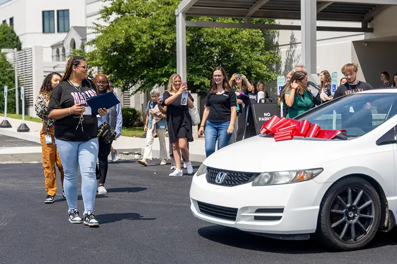 Middle-TN-Graduation-Event-2025-02 Graduate with surprise gift of a car