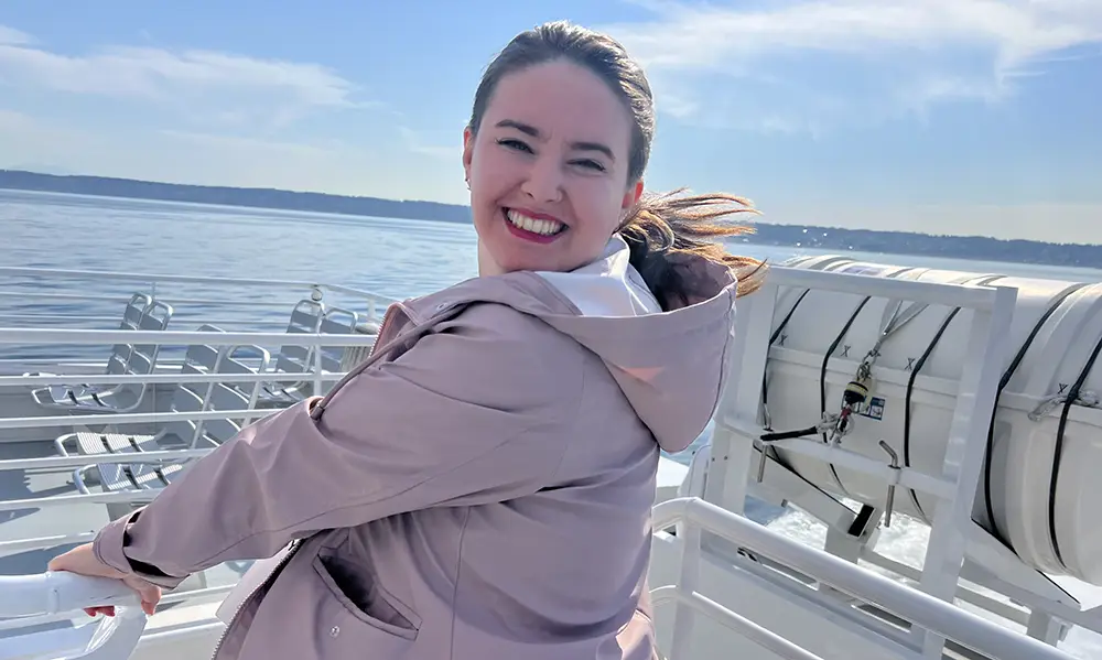 Syndey-H-Mentor Youth Villages mentor, Sydney smiling on a boat